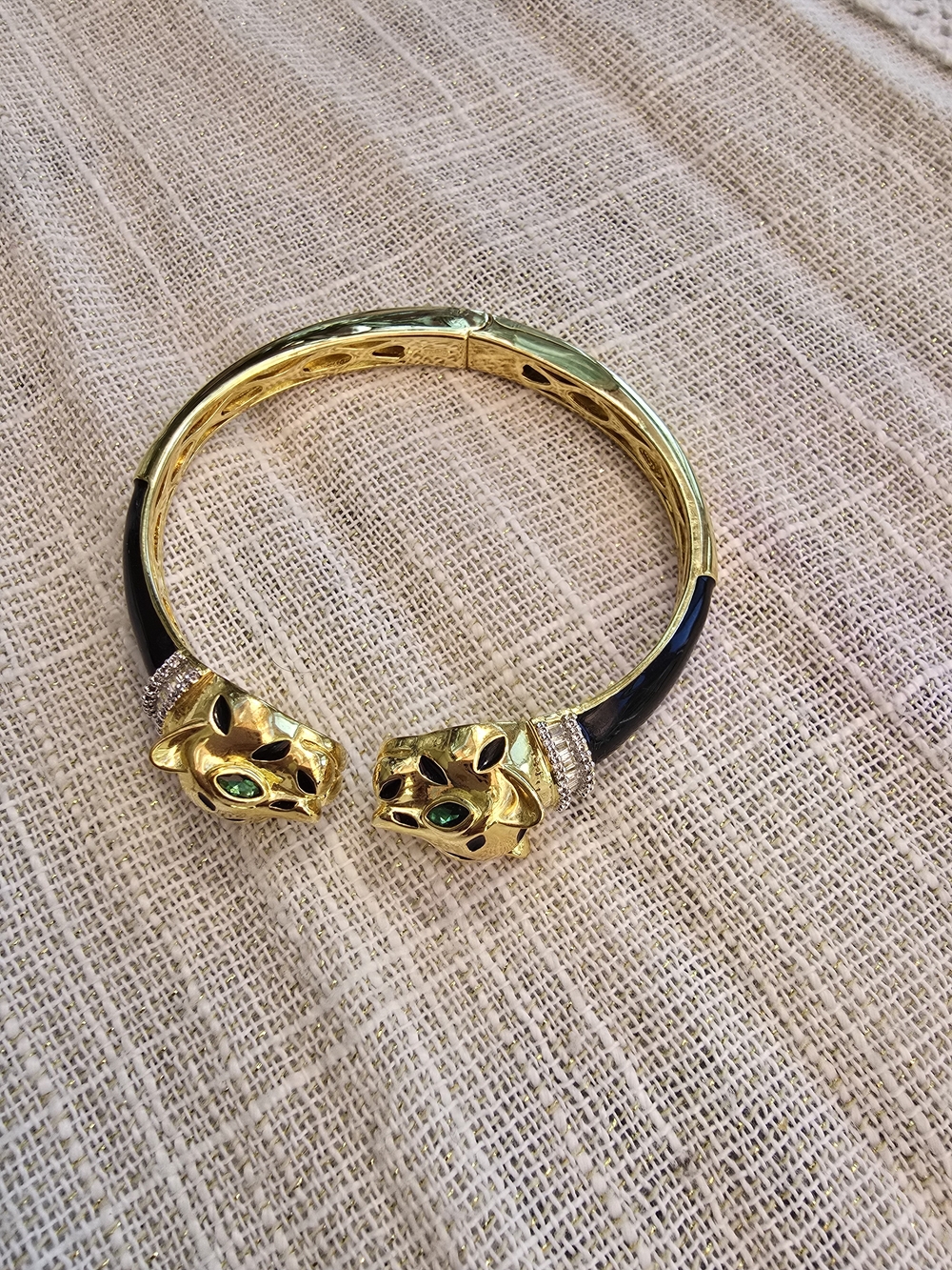 Gold-Tone Black Enamel Panther Head Bangle with Green Accents